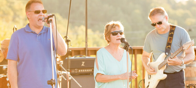 Trio of musicians playing at Carter Mountain in 2015