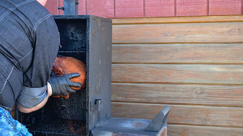 pork barbeque in smoker at Carter Mountain Orchard in Charlottesville